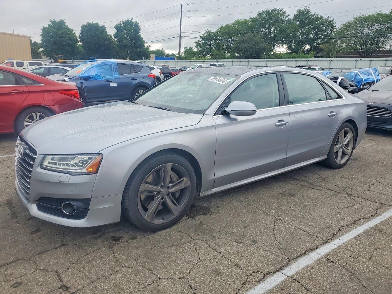 2018 Audi A8, VIN WAU44AFD0JN000149 — Side