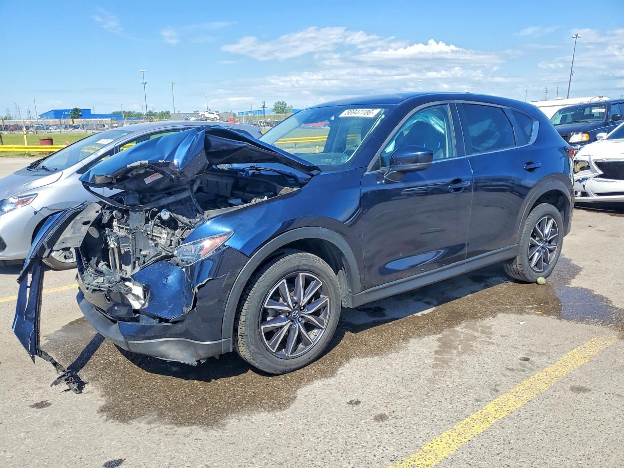 2018 Mazda CX-5 Touring, VIN JM3KFACM7J1448279 — Front end