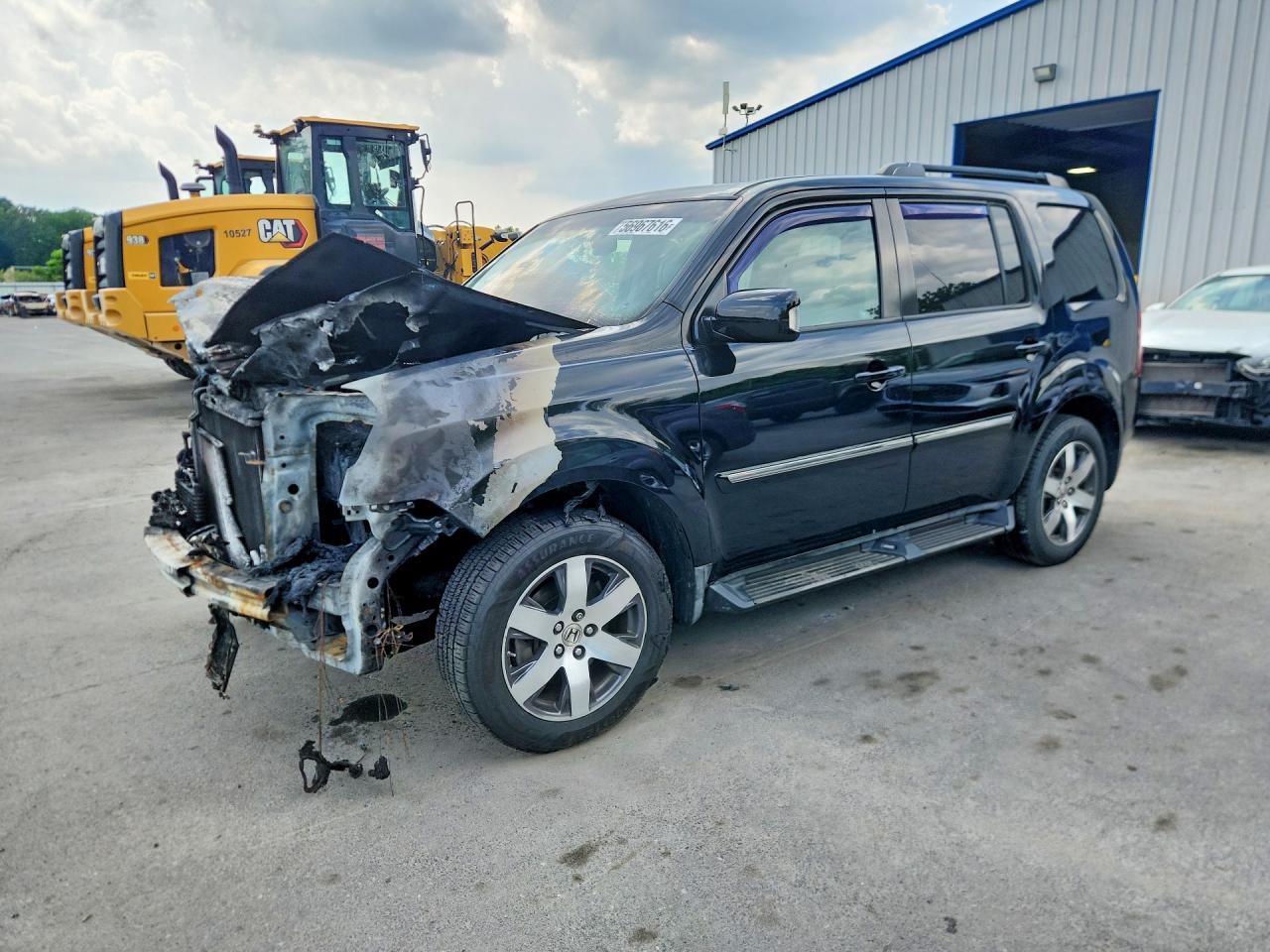 2012 Honda Pilot Touring, VIN 5FNYF4H97CB023132 — Engine fire