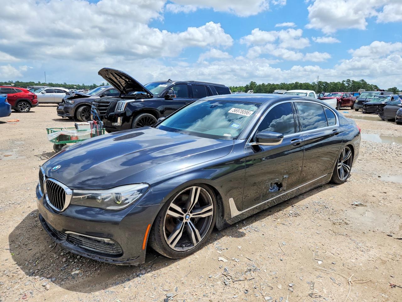 2018 BMW 7 Series 740i, VIN WBA7E2C57JG741481 — Minor dents and scratches