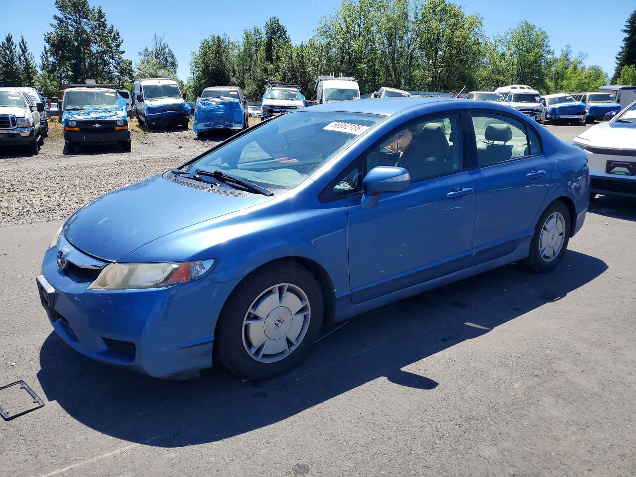 2009 Honda Civic, VIN JHMFA36219S005015 — Side