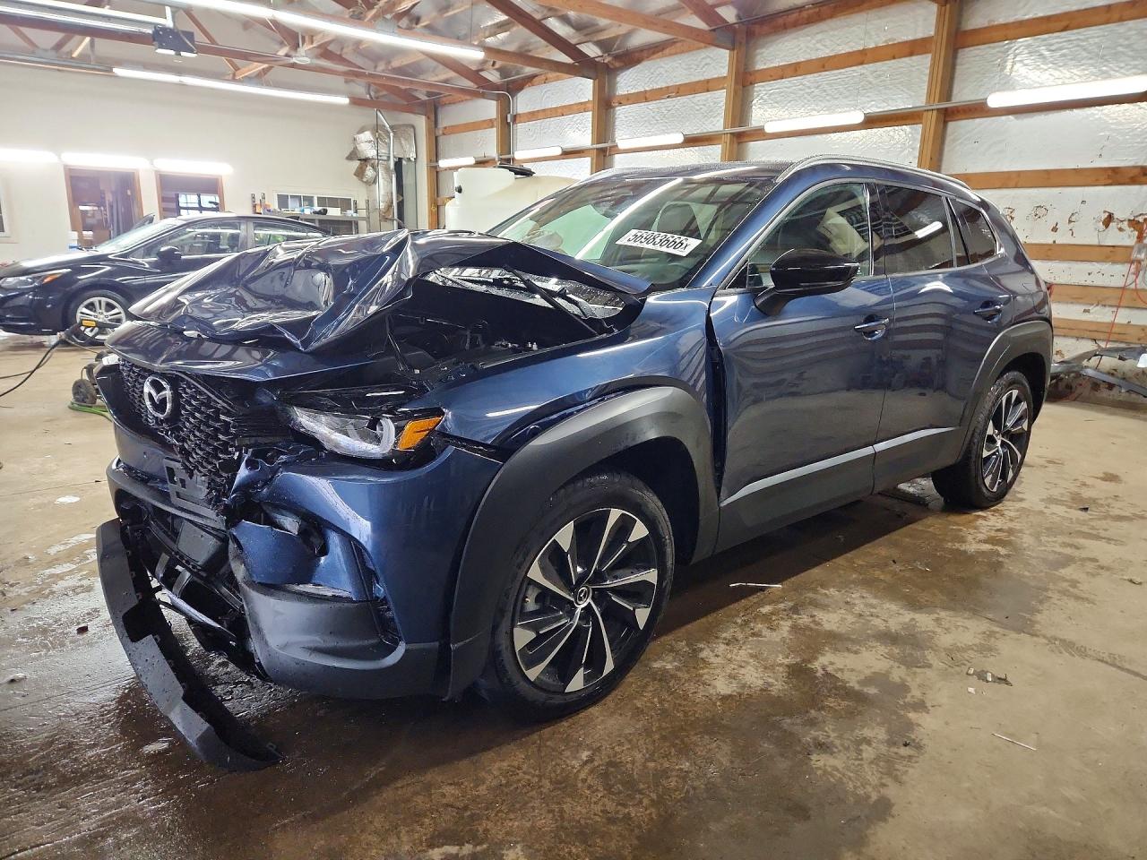 2026 Mazda CX-50 Hybrid Premium Plus, VIN 7MMVAAEW2TN160684 — Front end