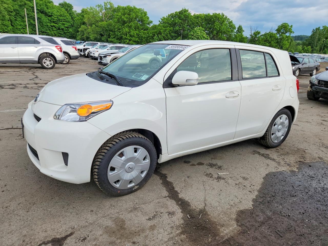 2013 Scion xD, VIN JTKKUPB49D1037840 — Side