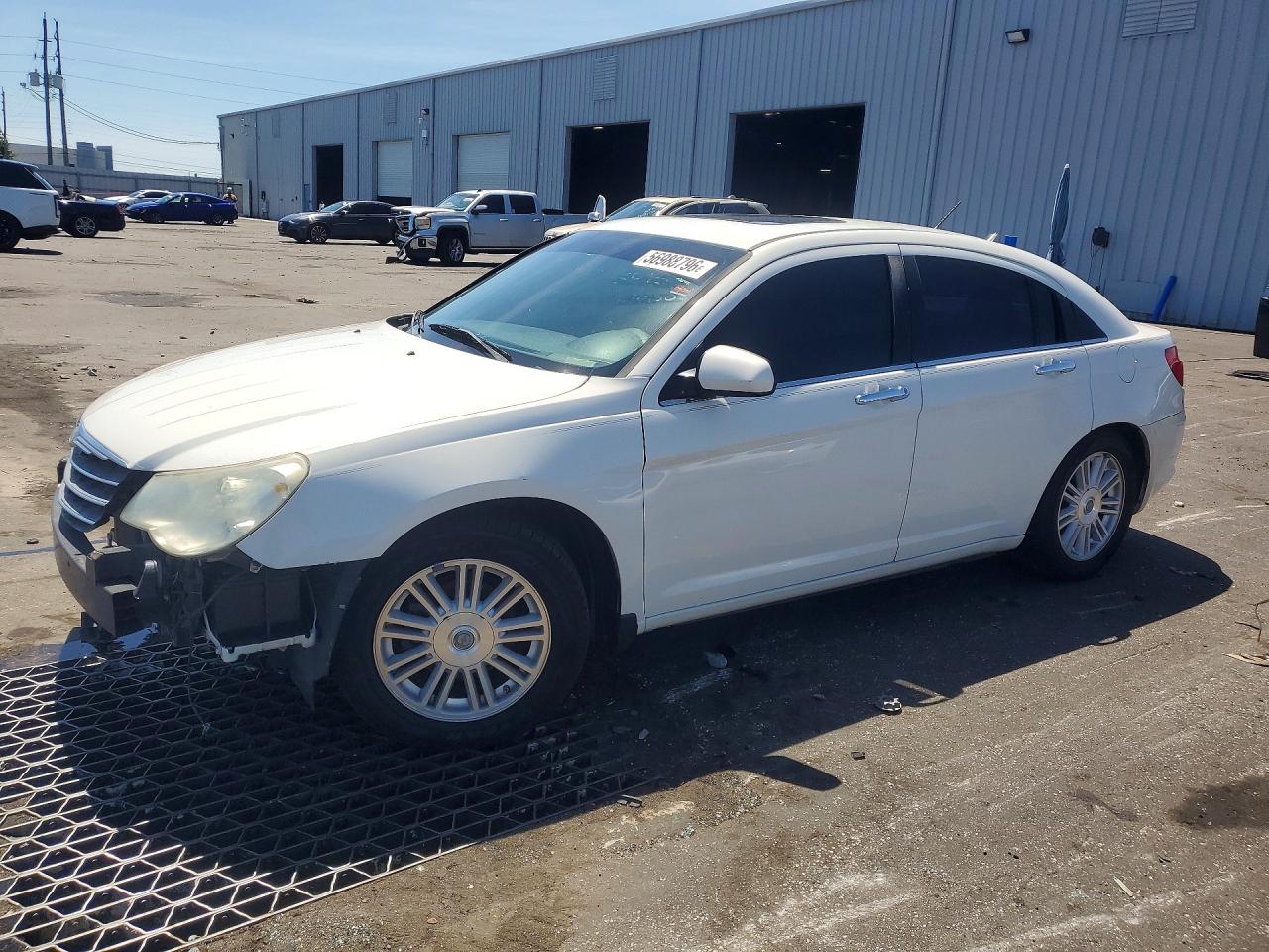 2009 Chrysler Sebring, VIN 1C3LC66B89N547280 — Vandalism