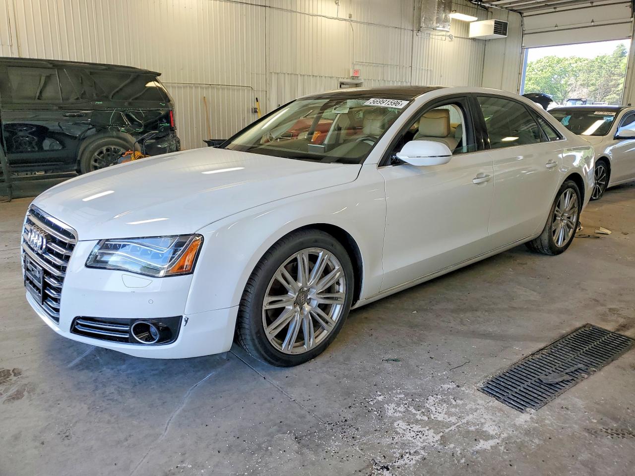 2014 Audi A8 3.0T, VIN WAURGAFDXEN005782 — Side