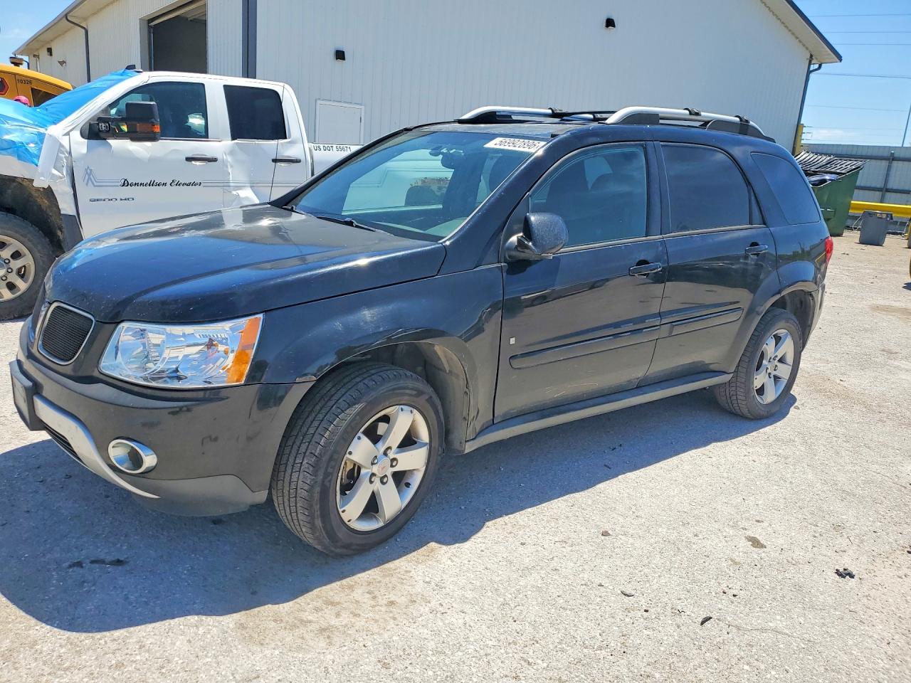 2006 Pontiac Torrent, VIN 2CKDL63F866209216 — Град
