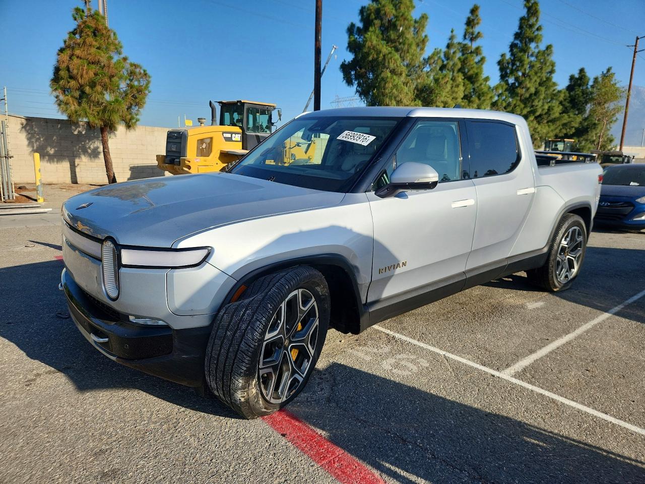 2022 Rivian R1T Adventure, VIN 7FCTGAAA2NN011852 — Front end