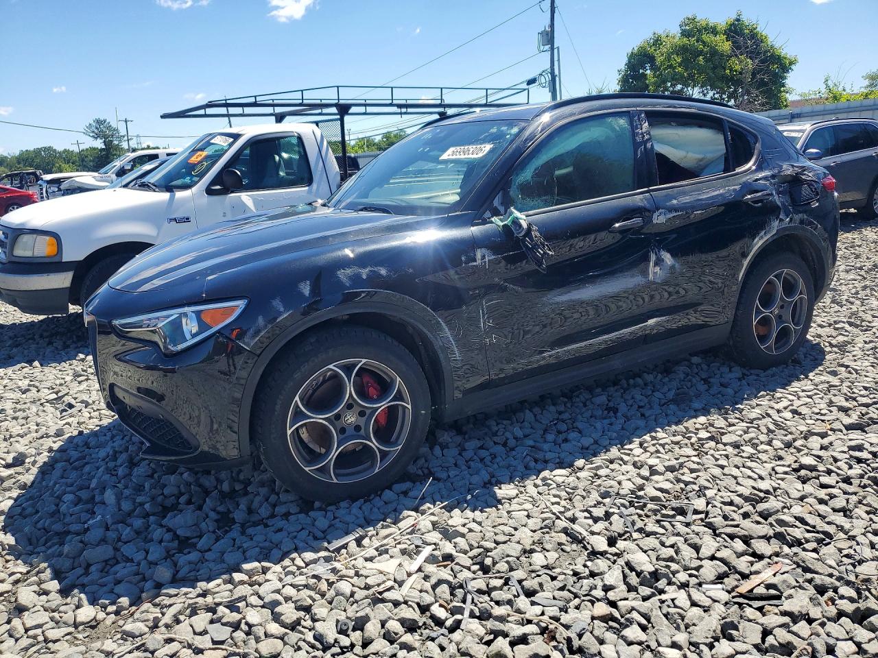 2022 Alfa Romeo Stelvio Sprint, VIN ZASPAKAN9N7D30629 — Бок