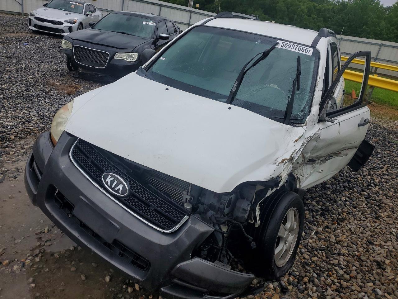 2007 Kia Sportage LX, VIN KNDJF723X77311519 — Перед