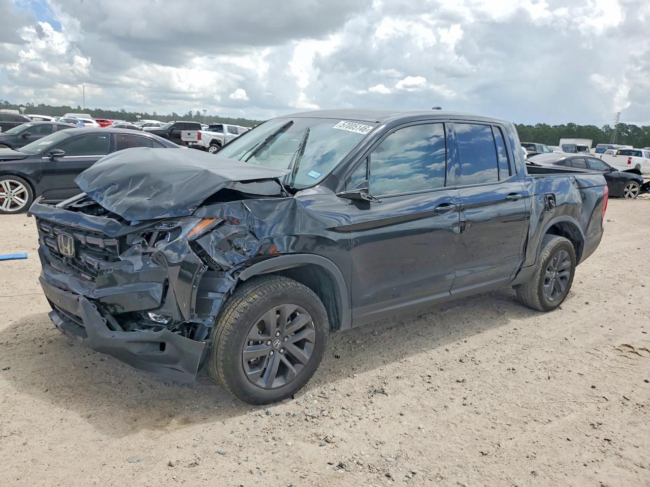 2024 Honda Ridgeline Sport, VIN 5FPYK3F1XRB032281 — Front end