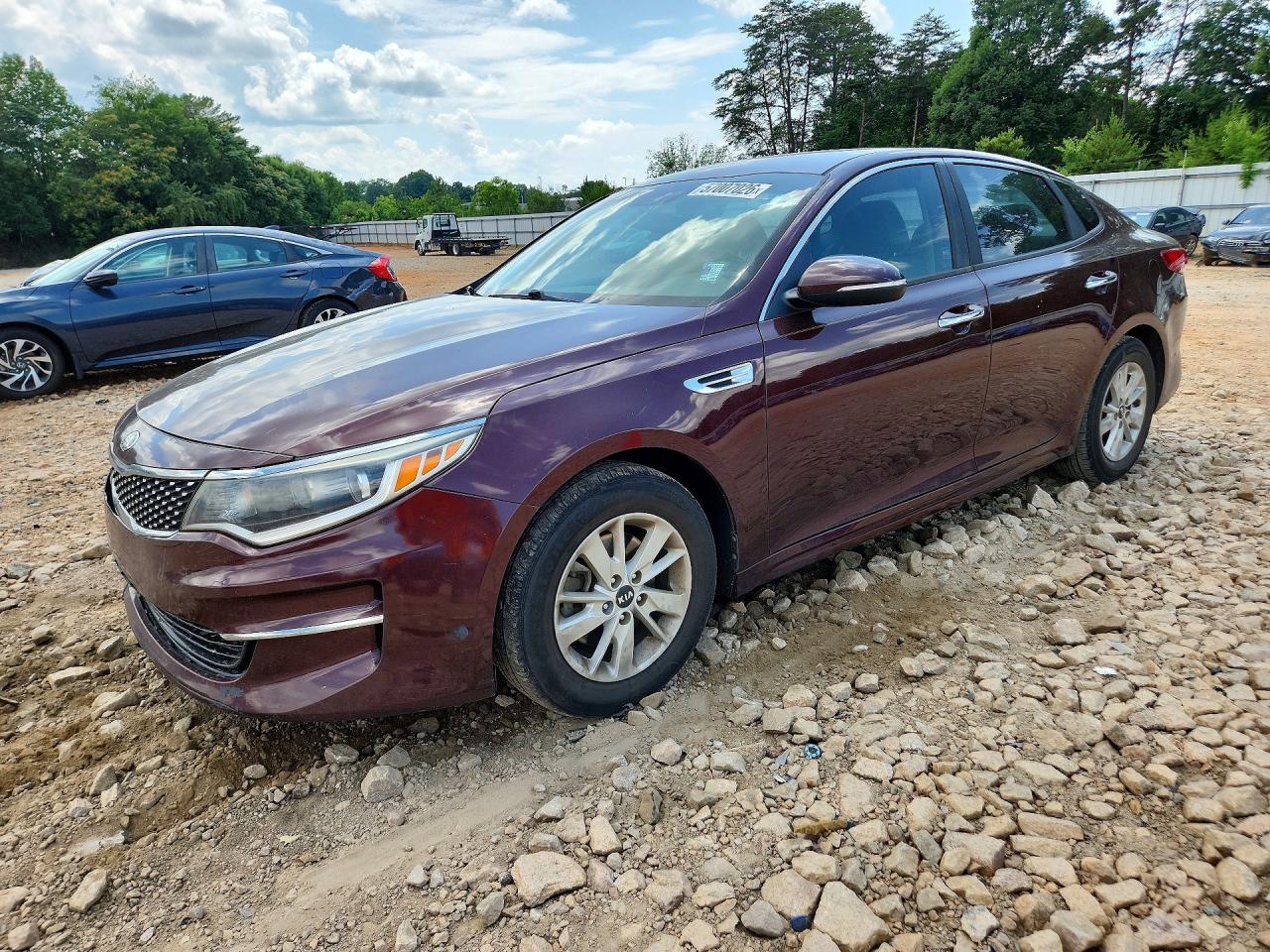2016 Kia Optima LX, VIN 5XXGT4L31GG104492 — Prior damage history