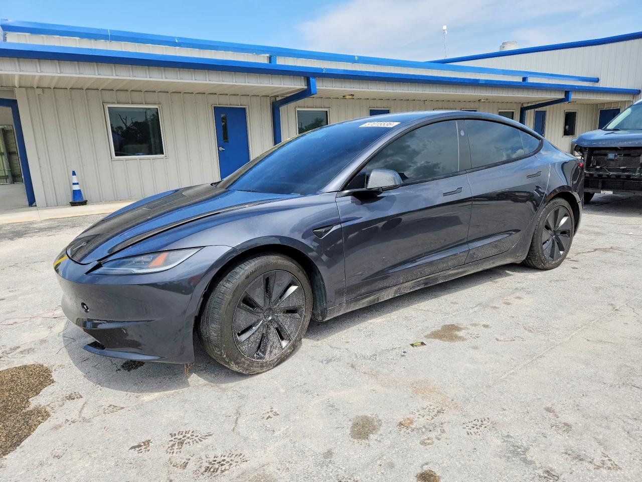 2025 Tesla Model 3 Long Range, VIN 5YJ3E1EA2SF980325 — Front end