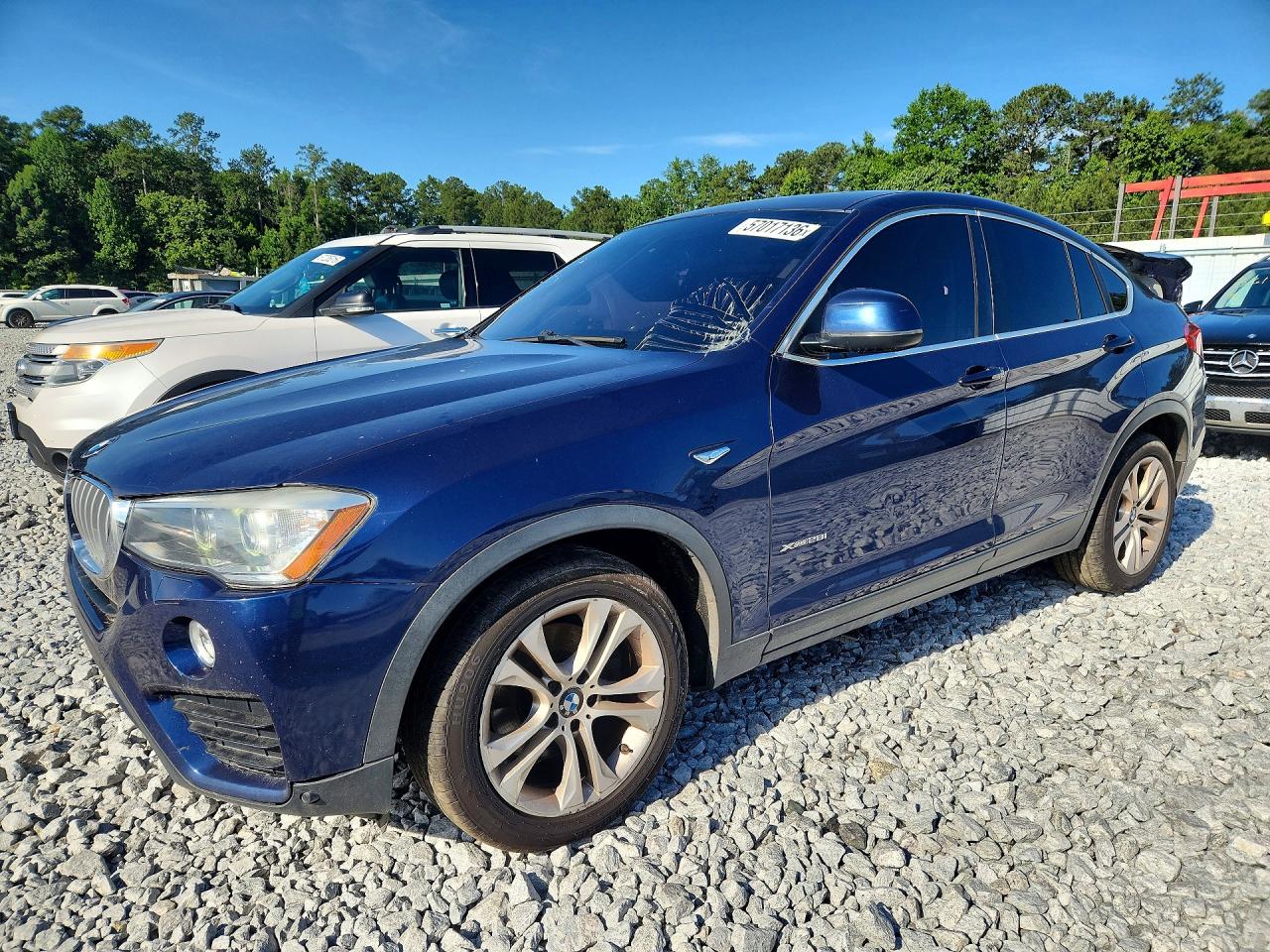 2017 BMW X4 xDrive28i, VIN 5UXXW3C50H0T78304 — Minor dents and scratches