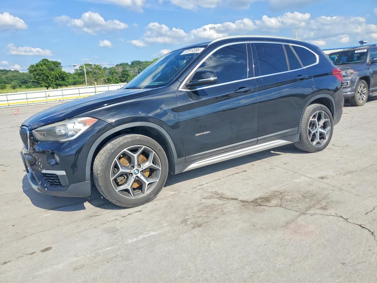 2018 BMW X1 sDrive28i, VIN WBXHU7C32J5H41735 — Minor dents and scratches