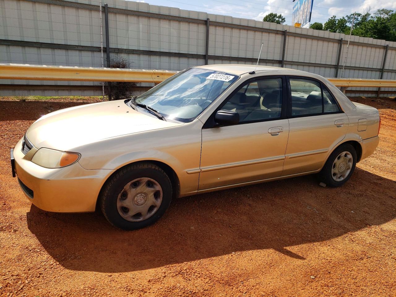 2001 Mazda Protege DX, VIN JM1BJ222810428786 — Обычный износ