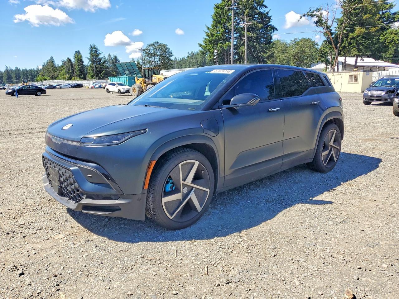 2023 Fisker Ocean Extreme, VIN VCF1EBU21PG009238 — Side