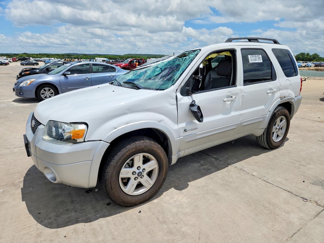 2007 Ford Escape Hybrid, VIN 1FMCU49H17KB90306 — Опрокидывание