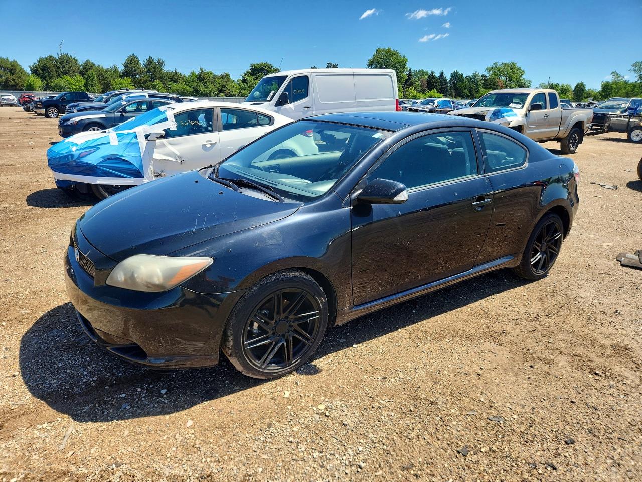 2010 Scion tC, VIN JTKDE3B70A0320573 — Side