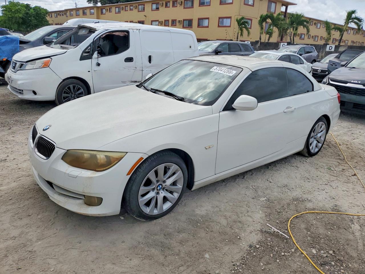 2011 BMW 3 Series 335i, VIN WBADX7C50BE261001 — Minor dents and scratches