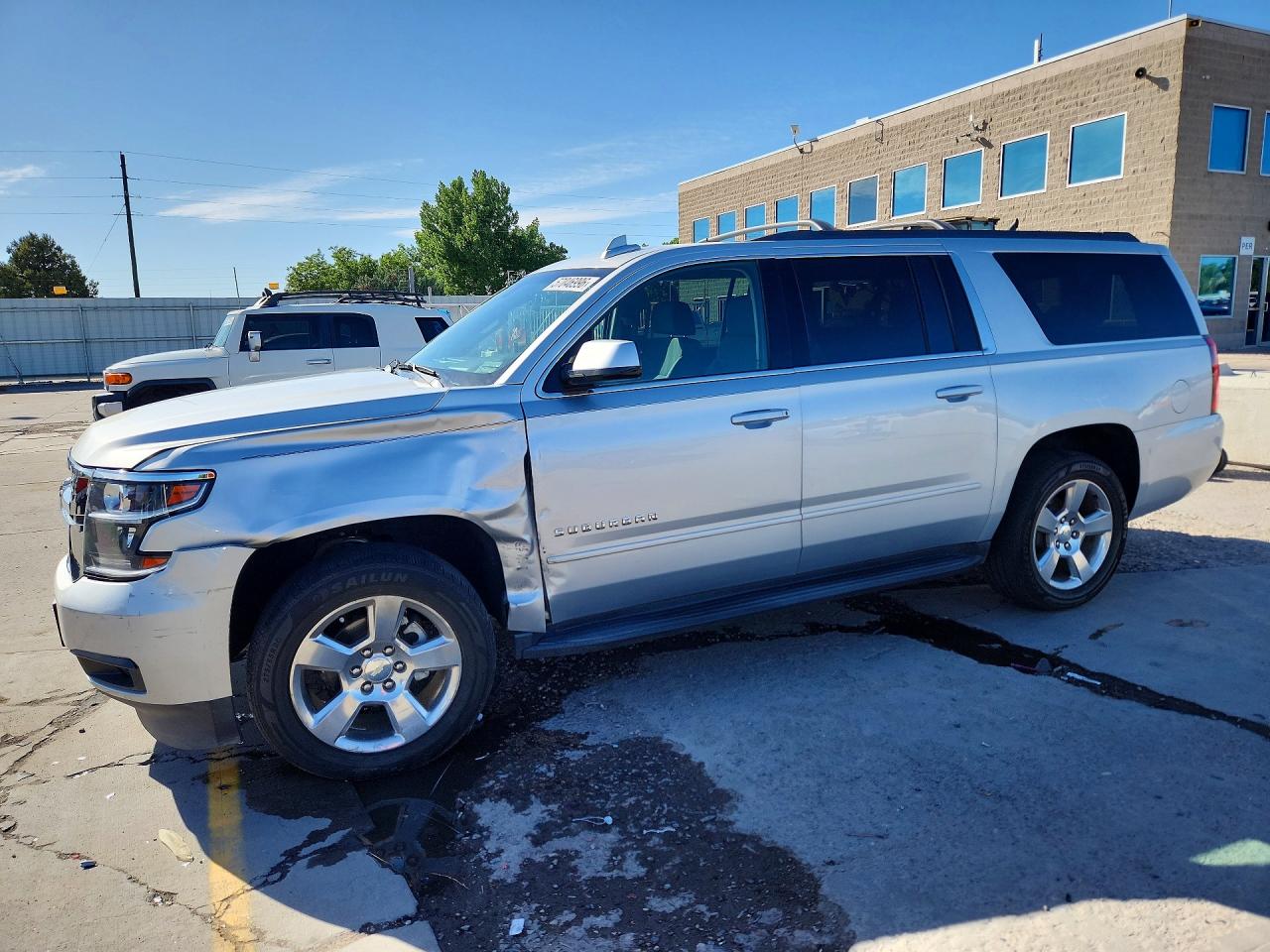 2017 Chevrolet Suburban LS, VIN 1GNSKGKC5HR302711 — Front end