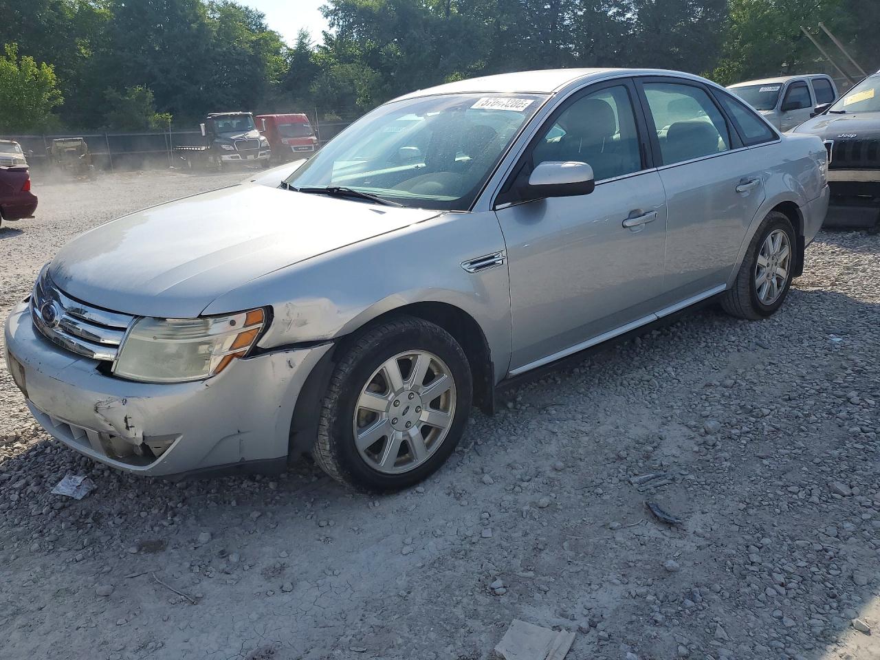 2009 Ford Taurus SE, VIN 1FAHP23W79G112668 — Front end
