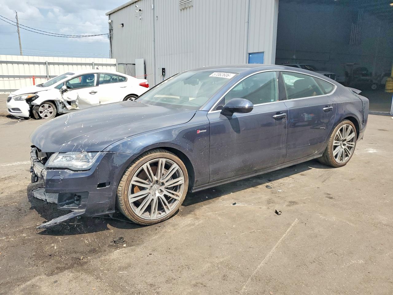 2015 Audi A7 Premium Plus, VIN WAUWGAFC7FN024088 — Бок
