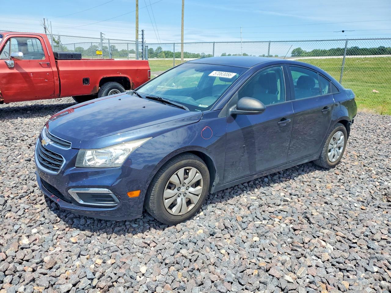 2015 Chevrolet Cruze LS, VIN 1G1PA5SG5F7229477 — Rear end