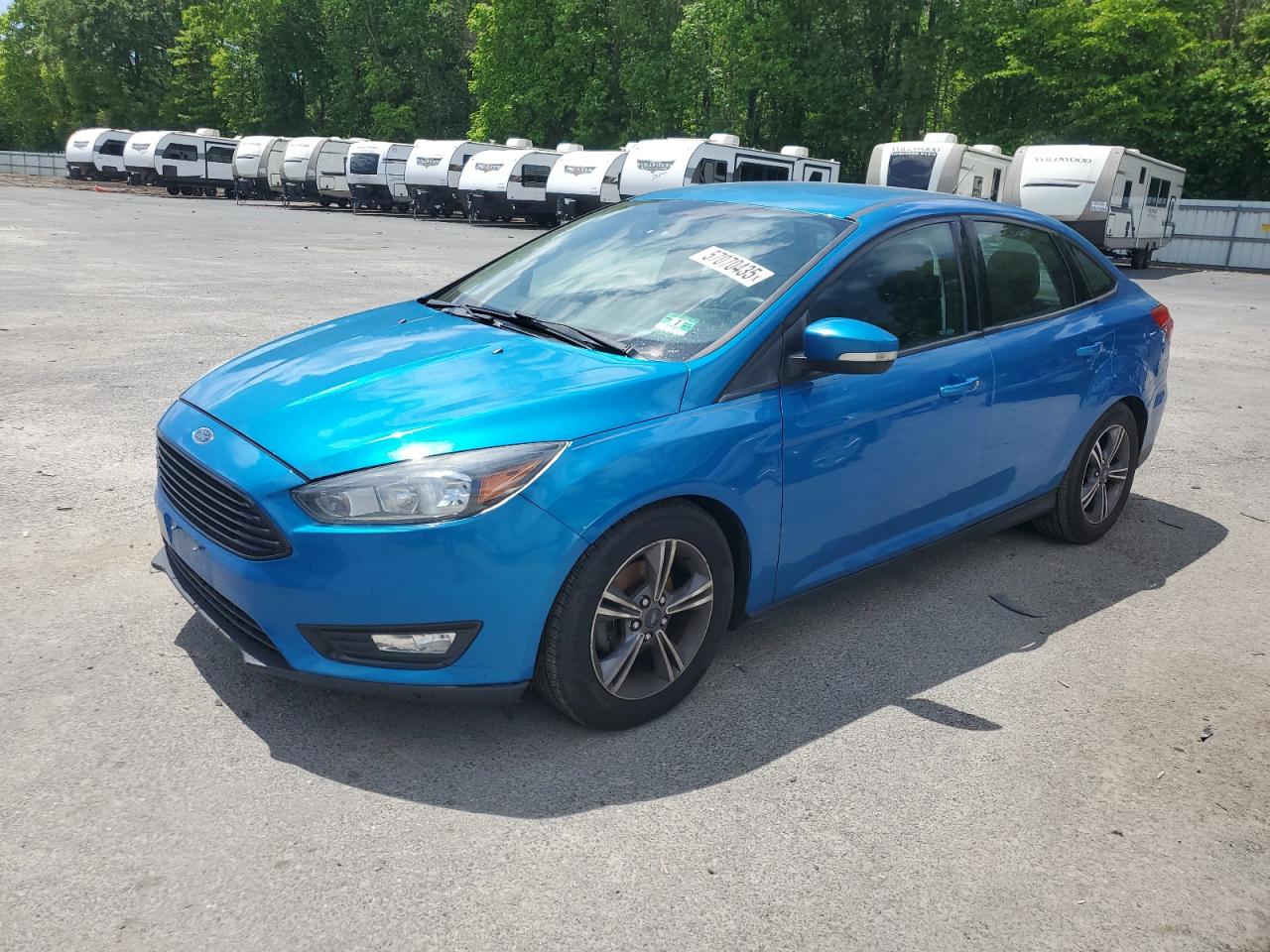 2016 Ford Focus SE, VIN 1FADP3FE2GL229229 — Minor dents and scratches