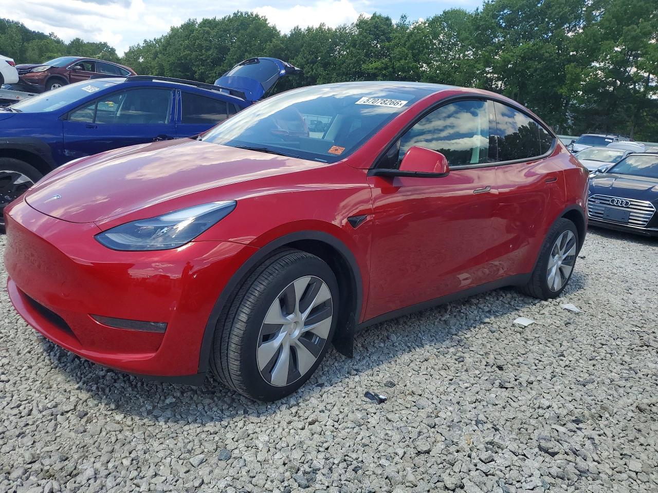 2023 Tesla Model Y Long Range, VIN 7SAYGDEE9PA211705 — Auction photo 1 of 12