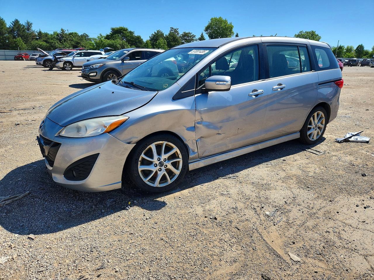 2015 Mazda 5 Touring, VIN JM1CW2CL7F0189106 — Side