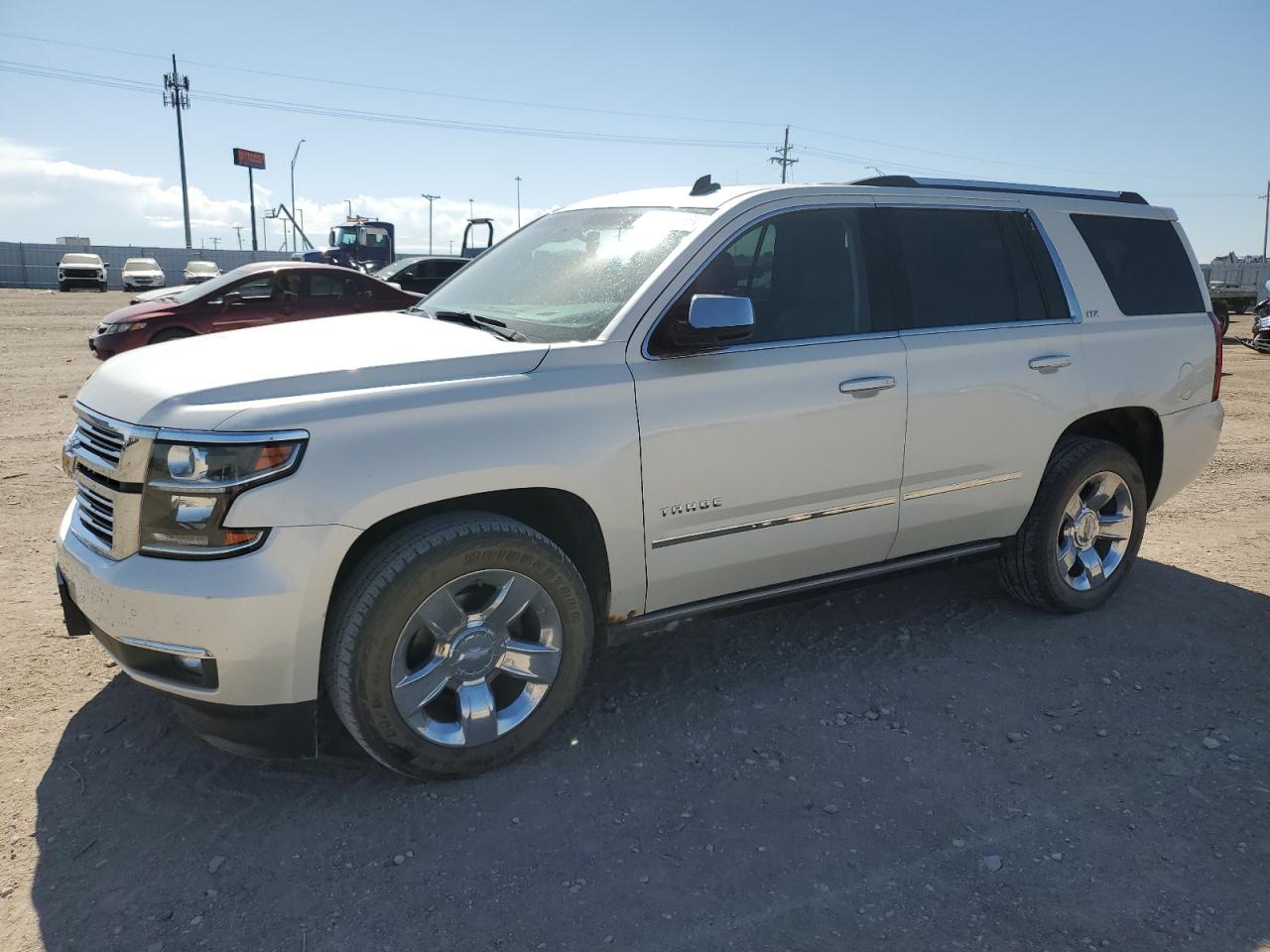 2015 Chevrolet Tahoe LTZ, VIN 1GNSKCKC4FR102974 — Hail