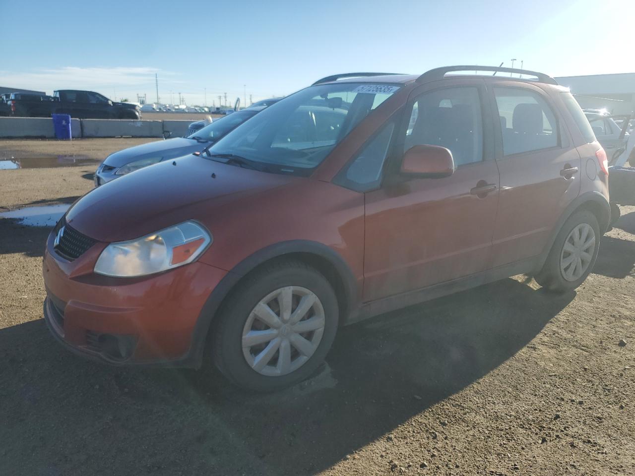 2011 Suzuki SX4 Crossover, VIN JS2YB5A33B6301113 — Hail