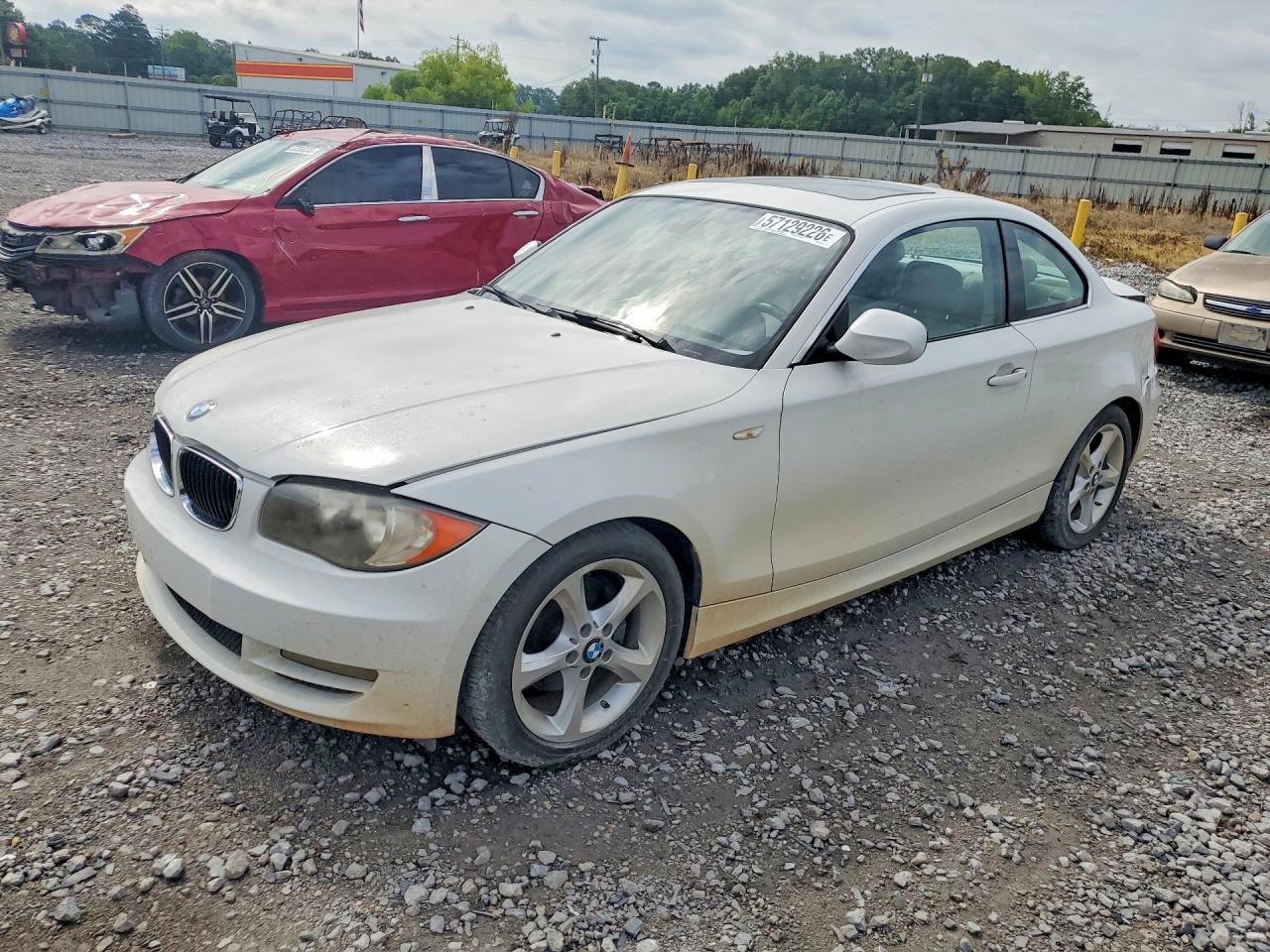 2011 BMW 1 Series 128i, VIN WBAUP7C57BVP21514 — Rear end