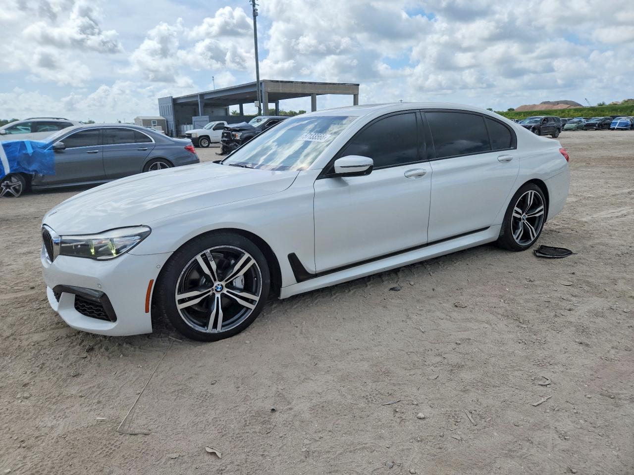 2016 BMW 7 Series 740i, VIN WBA7E2C58GG547860 — Minor dents and scratches