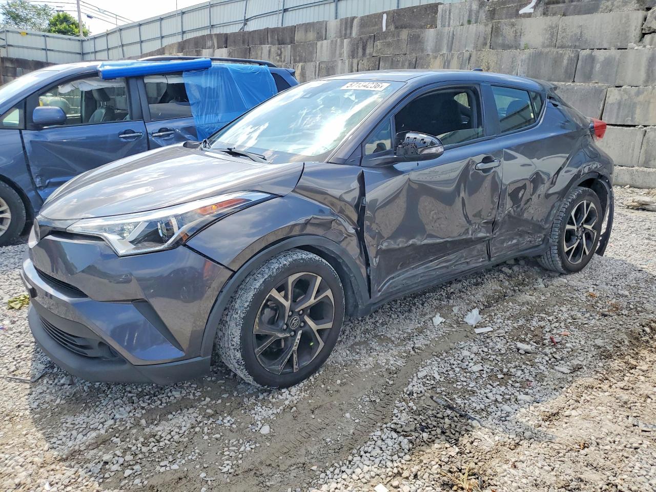 2019 Toyota C-HR LE, VIN JTNKHMBX6K1036688 — Side