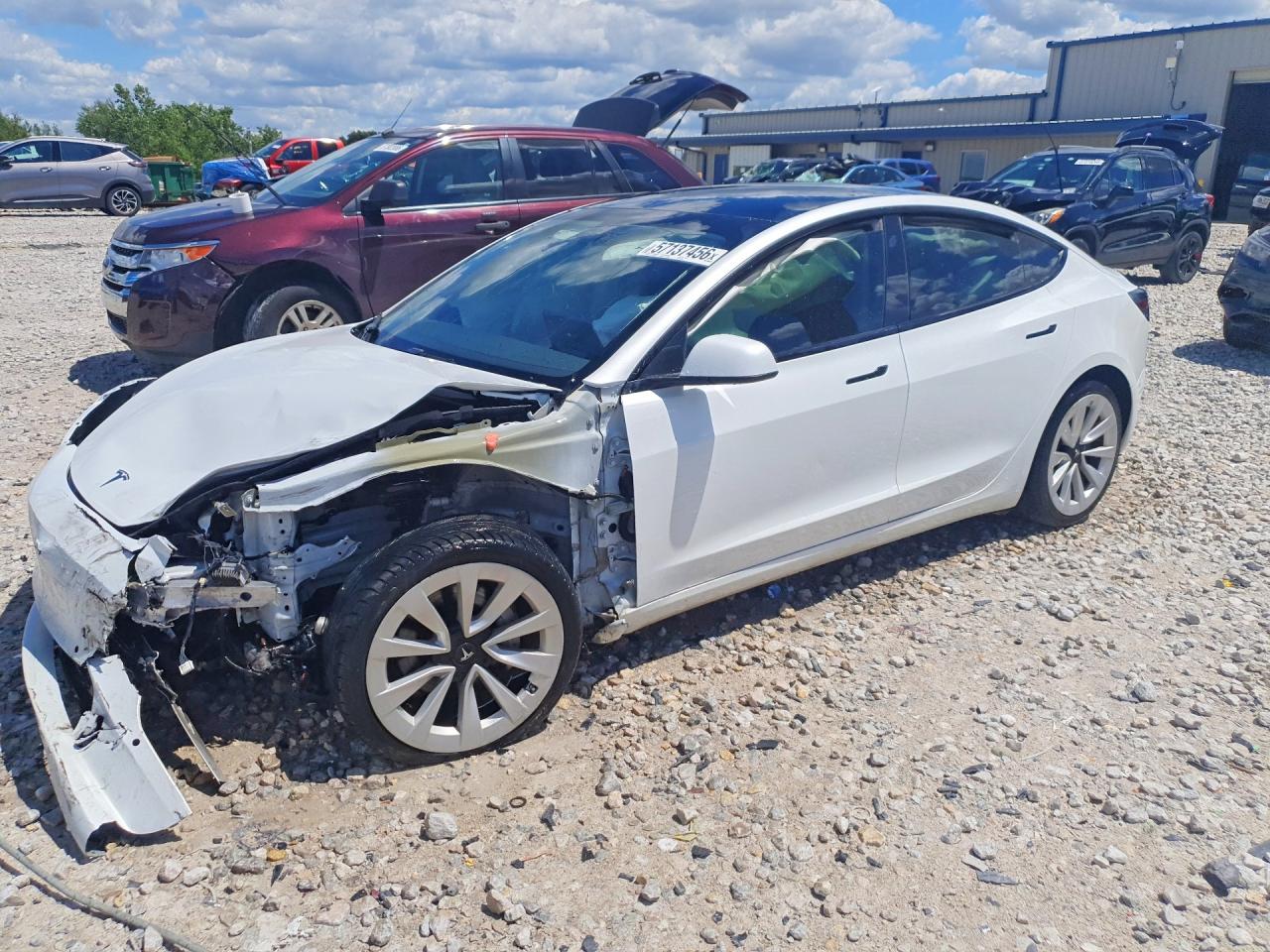2022 Tesla Model 3 Long Range, VIN 5YJ3E1EB7NF335196 — Бок
