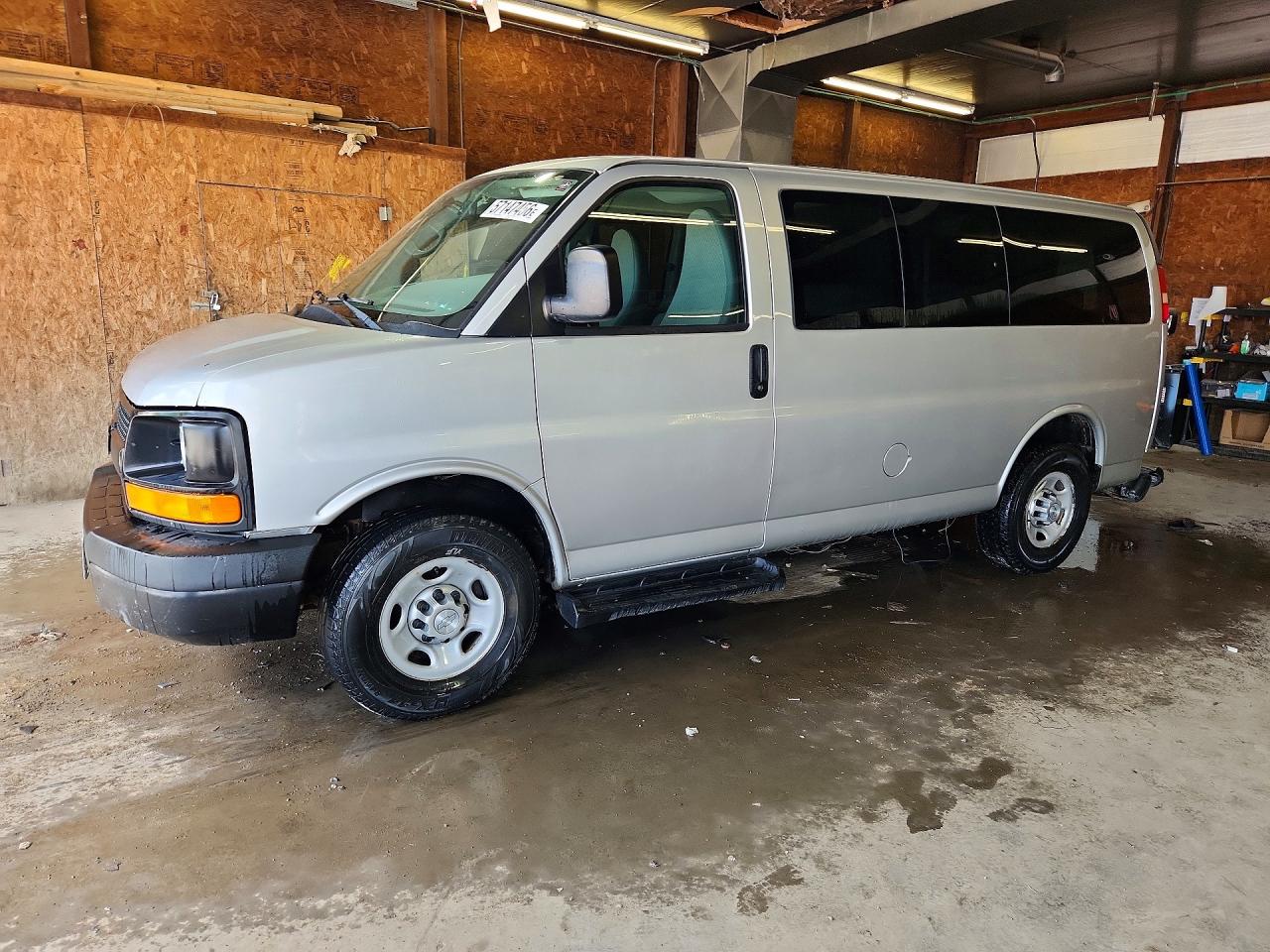 2014 Chevrolet Express Passenger LS, VIN 1GAWGPFA8E1193846 — Rear end