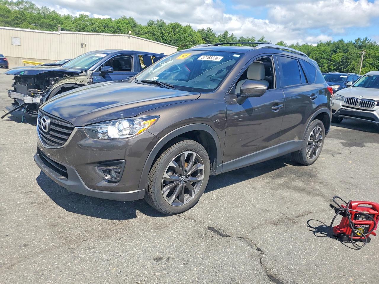 2016 Mazda CX-5 Grand Touring, VIN JM3KE4DYXG0752274 — Stripped