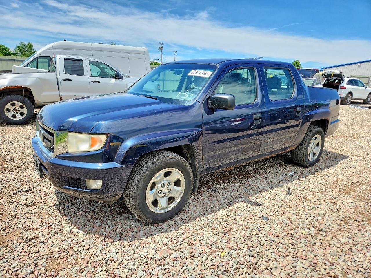 2011 Honda Ridgeline RT, VIN 5FPYK1F21BB005036 — Minor dents and scratches