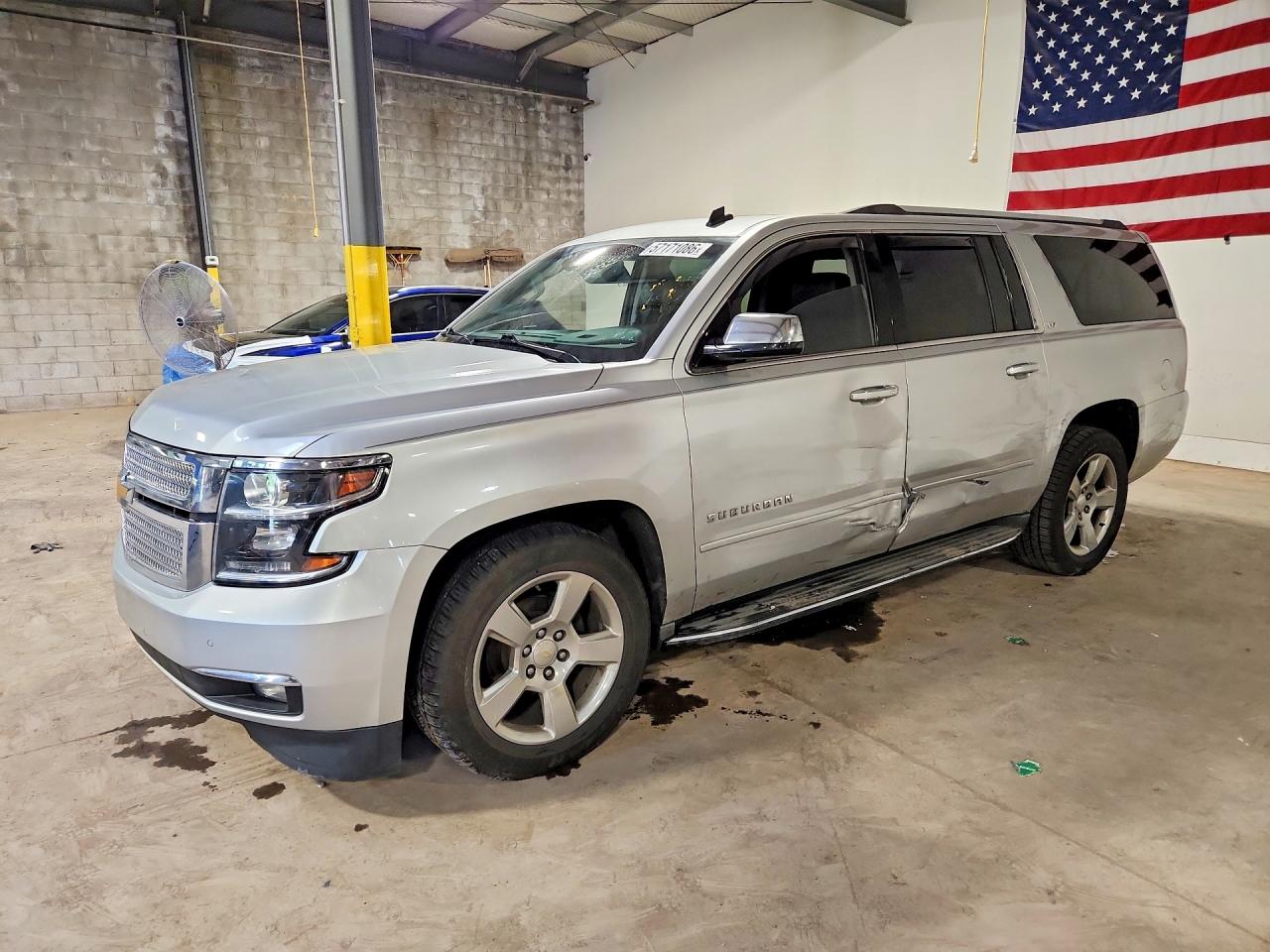 2015 Chevrolet Suburban LTZ, VIN 1GNSKKKC9FR206175 — Side