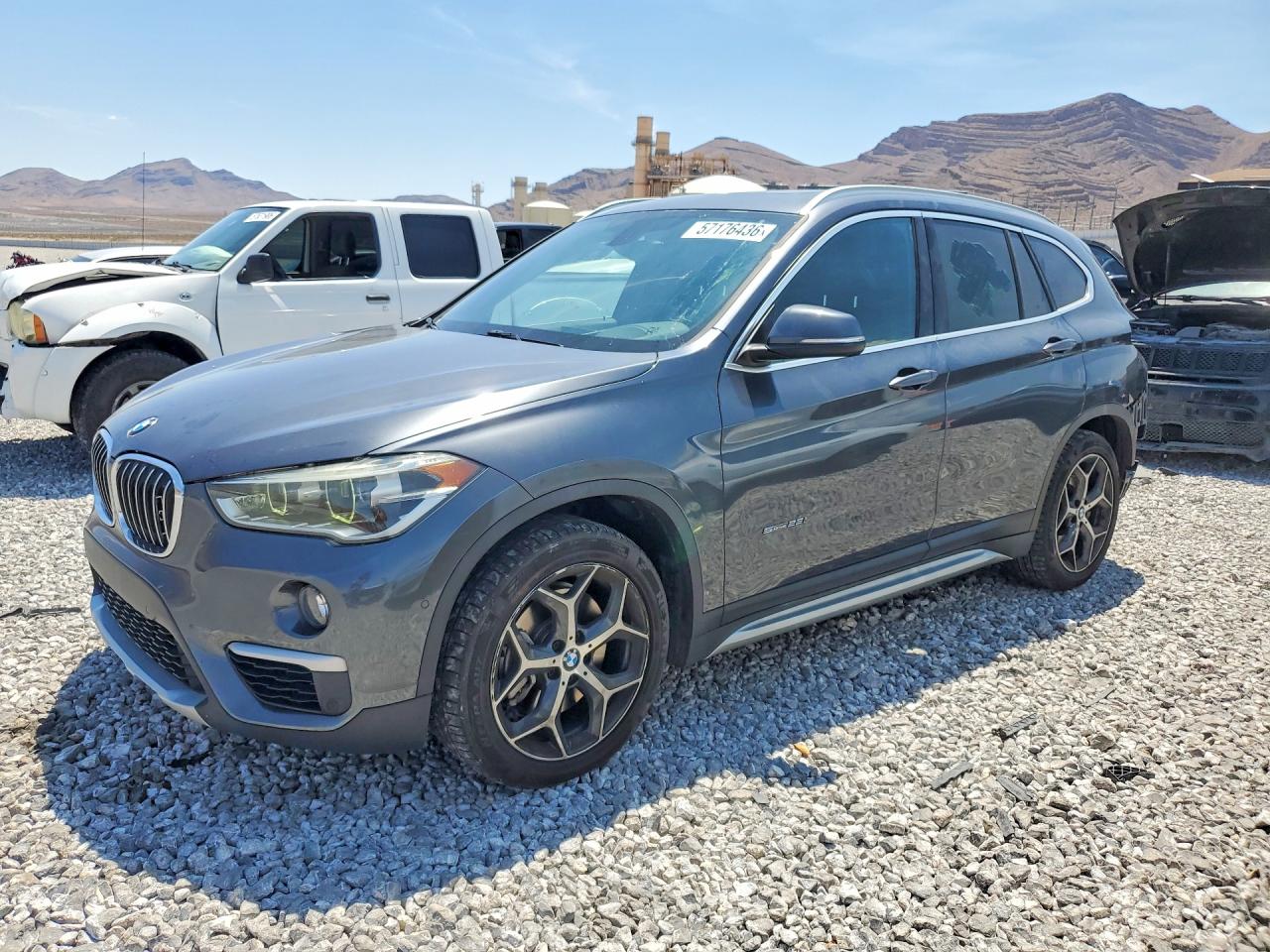 2017 BMW X1 sDrive28i, VIN WBXHU7C39H5H33349 — Rear end