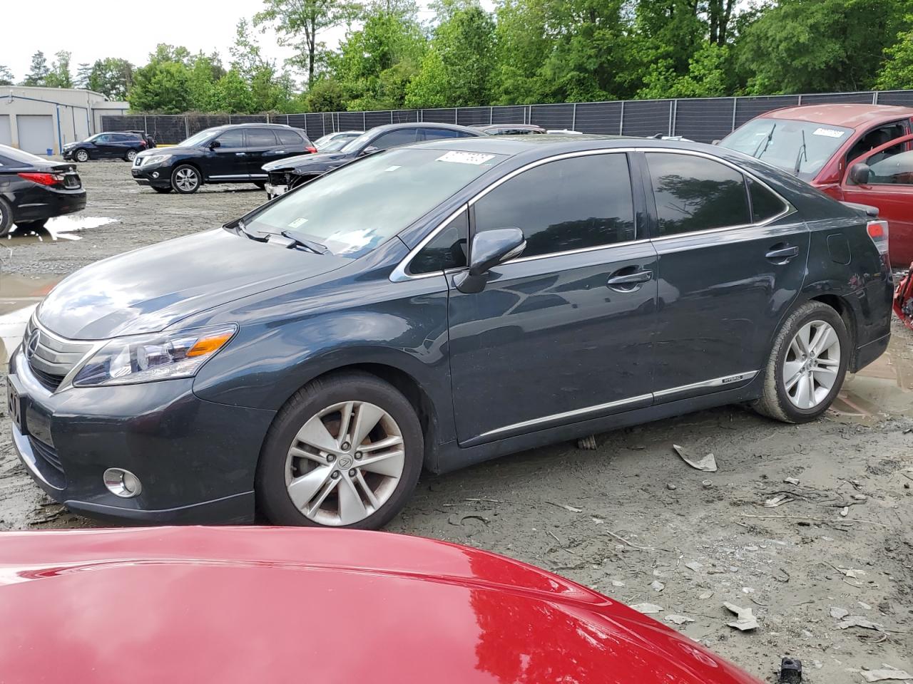 2011 Lexus HS 250h, VIN JTHBB1BA5B2046802 — Minor dents and scratches
