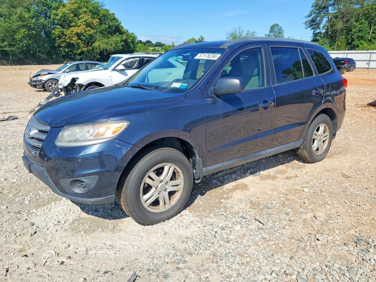2012 Hyundai Santa Fe GLS, VIN 5XYZGDAB8CG103580 — Prior damage history
