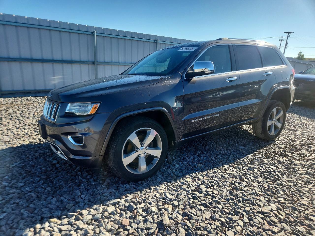 2016 Jeep Grand Cherokee Overland, VIN 1C4RJFCG6GC359572 — Перед