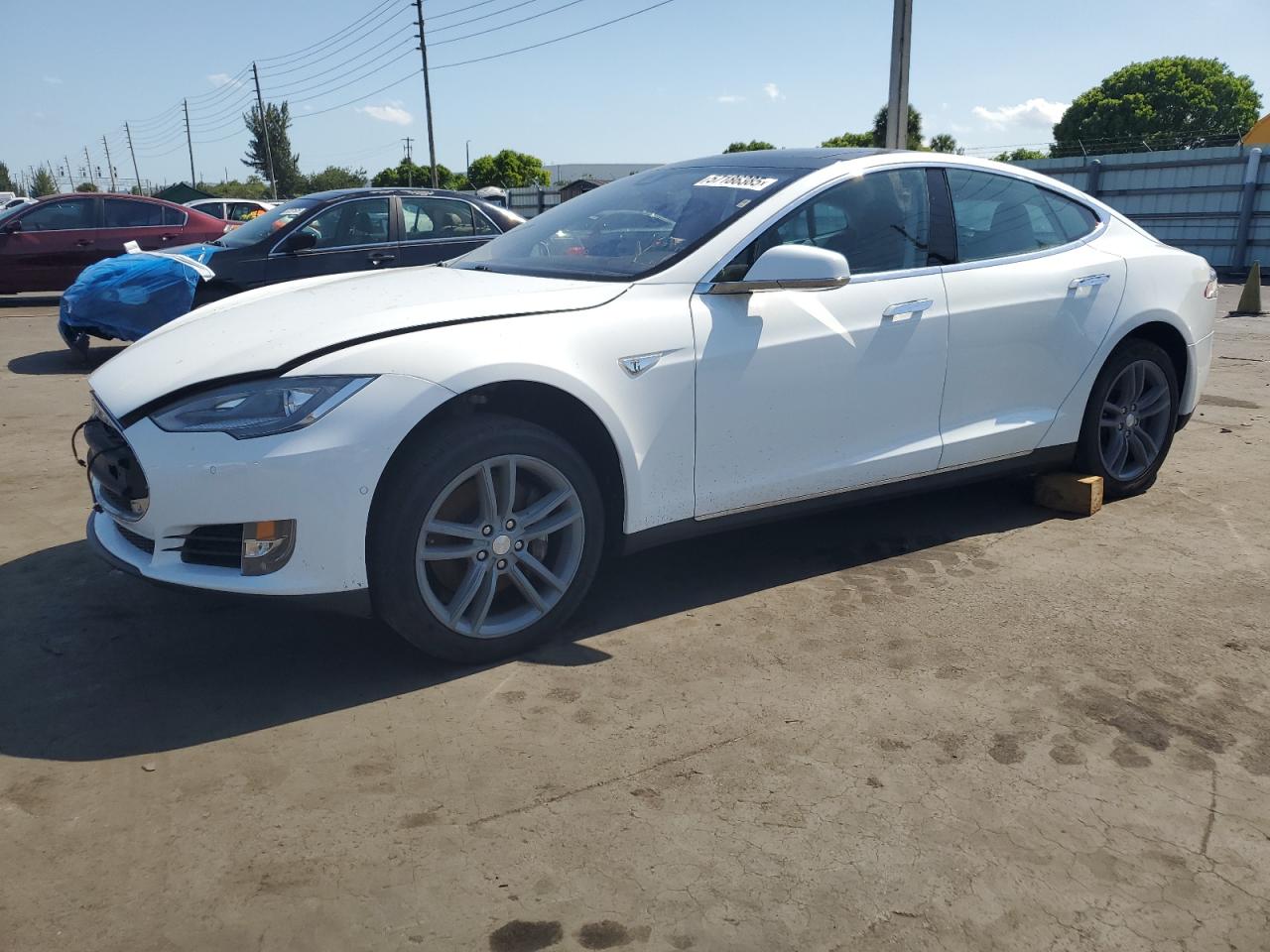 2015 Tesla Model S 85, VIN 5YJSA1S13FFP77834 — Partial repair