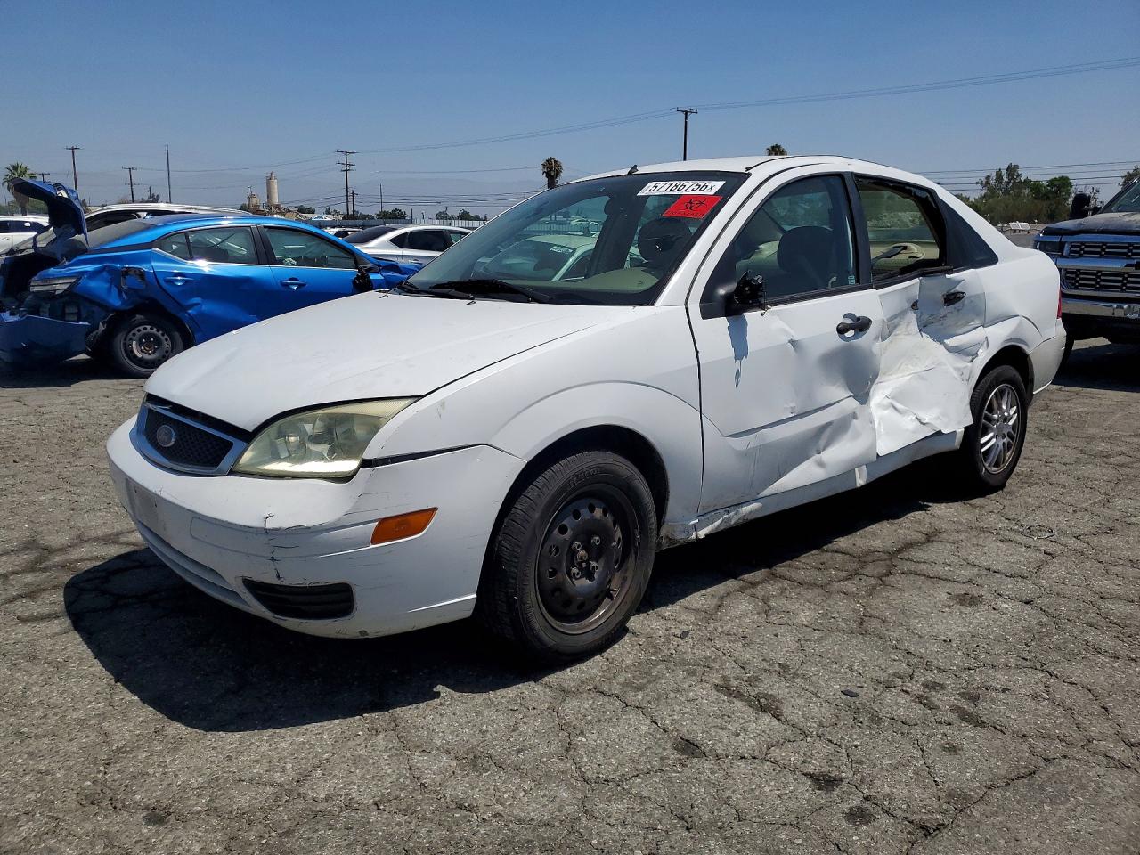 2006 Ford Focus S, VIN 1FAFP34NX6W103757 — Side