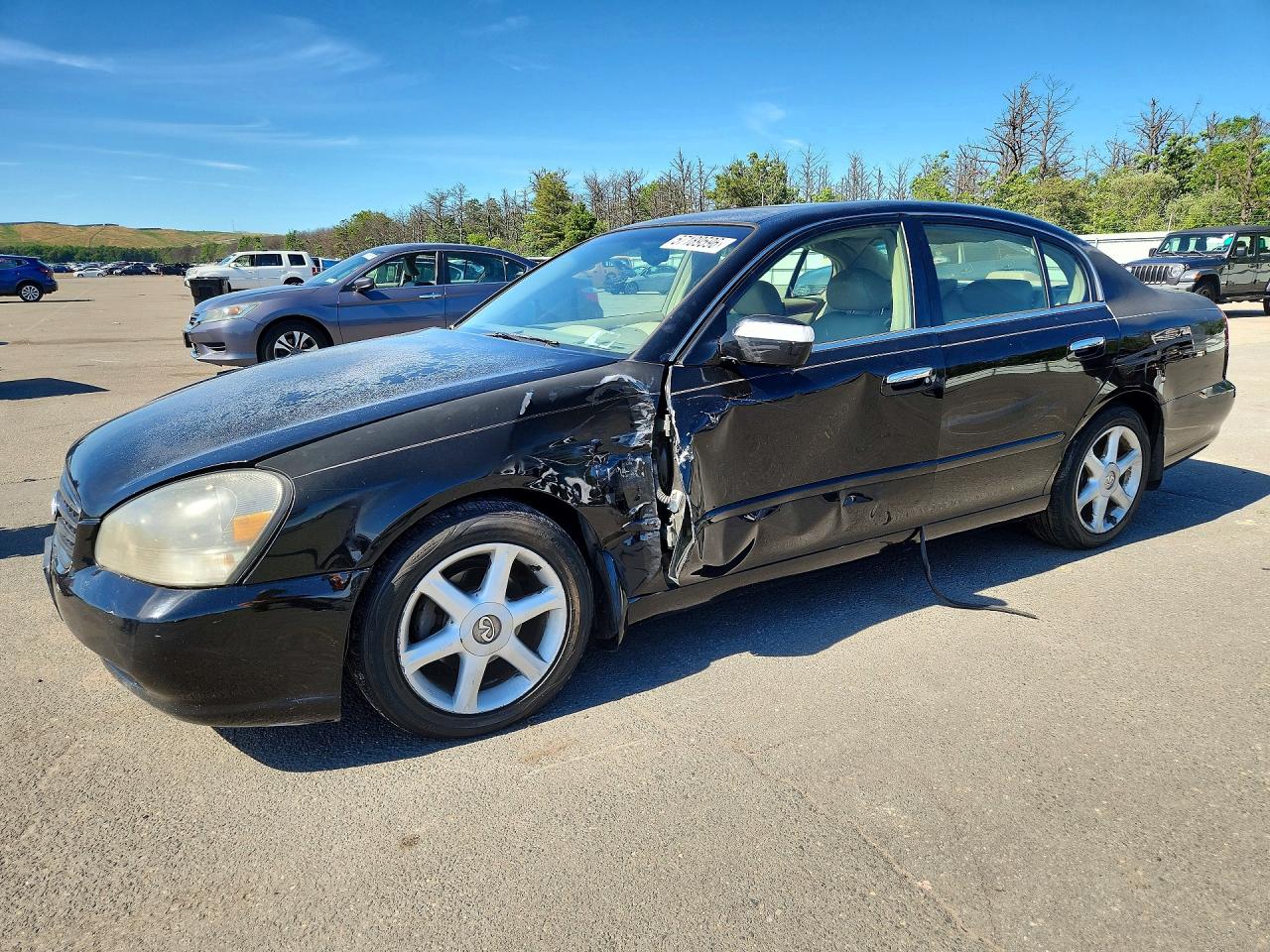 2003 Infiniti Q45, VIN JNKBF01A83M103189 — Front end