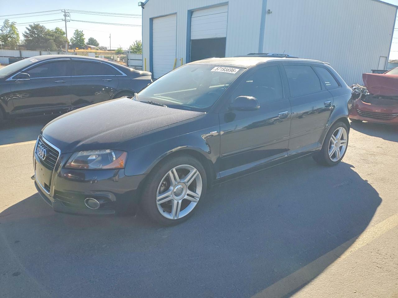 2013 Audi A3 Premium Plus, VIN WAUKJAFM4DA022764 — Зад