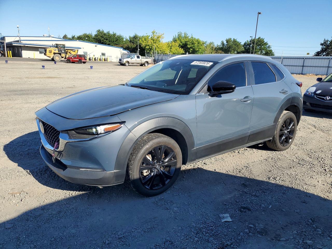 2023 Mazda CX-30 S Preferred, VIN 3MVDMBCM3PM560892 — Side