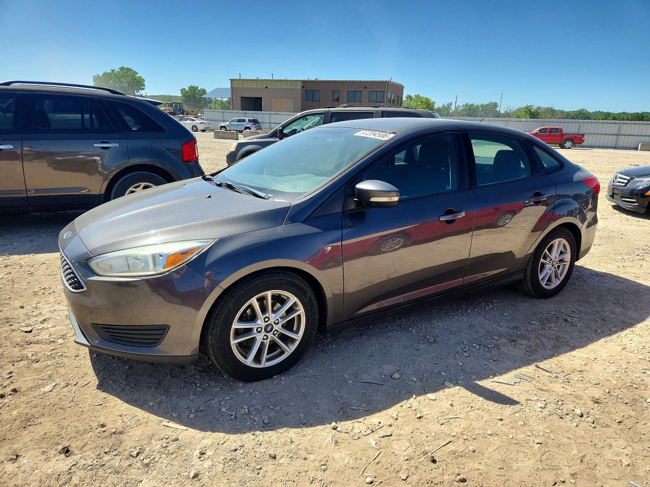 2015 Ford Focus SE, VIN 1FADP3F28FL231328 — Hail